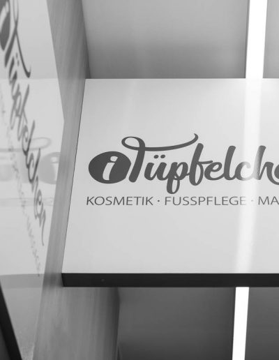 i-Tüpfelchen Firmenschild